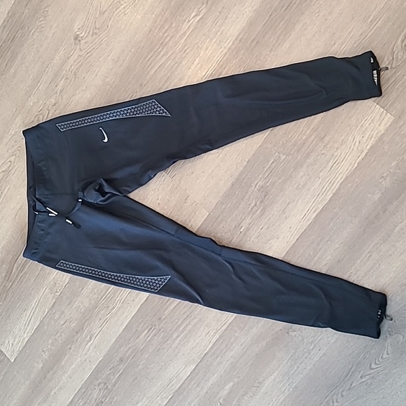 Like new Nike Black long Reflective leggings. - Picture 1 of 6
